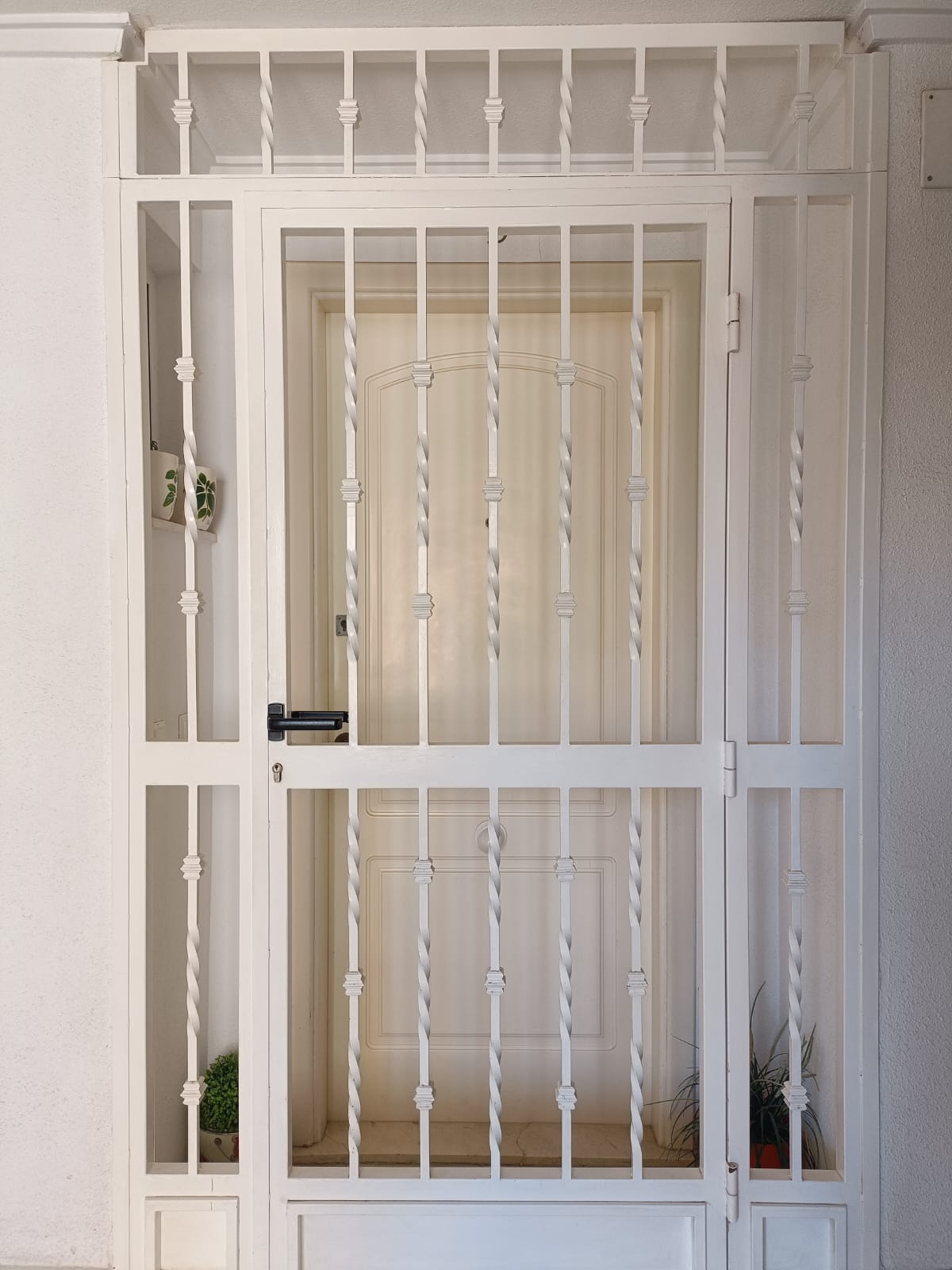 Made-to-measure white security grille door